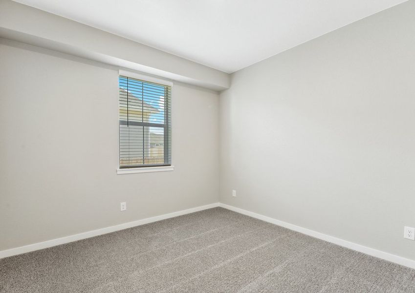 The secondary bedroom has carpet.