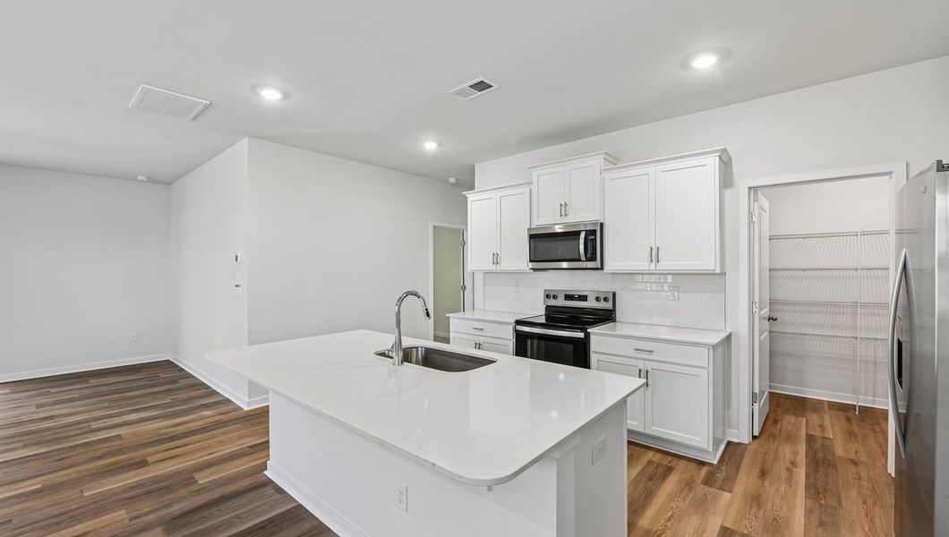 Furnished interior view inside a new home in The Falls at Newton, Newton (Image 3).