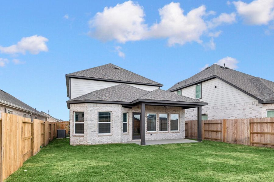 Exterior details and patio area of a home in Marvida, Cypress (Image 13).