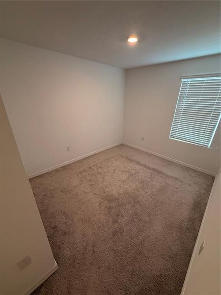 Spacious, unfurnished interior of a new home in The Townhomes at Anthem Park, St. Cloud (Image 8).