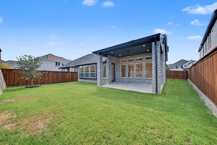 Exterior details and patio area of a home in Aster Park, McKinney (Image 4).