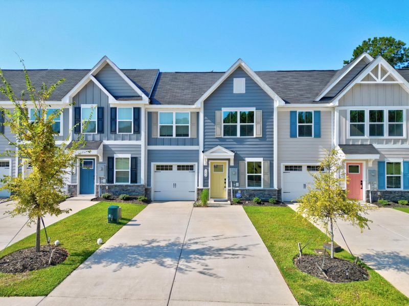 Front exterior of a new home in , Santee, SC, highlighting curb appeal (Image 20).