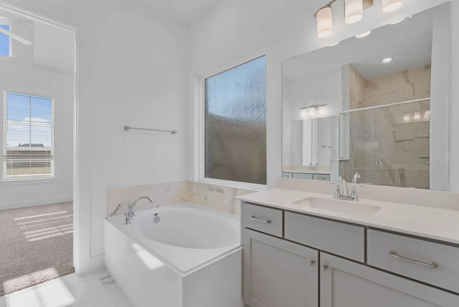 Representative furnished interior of a home built from the St Andrews by Chesmar Homes in Riceland Alley Loads, Mont Belvieu (Image 9).