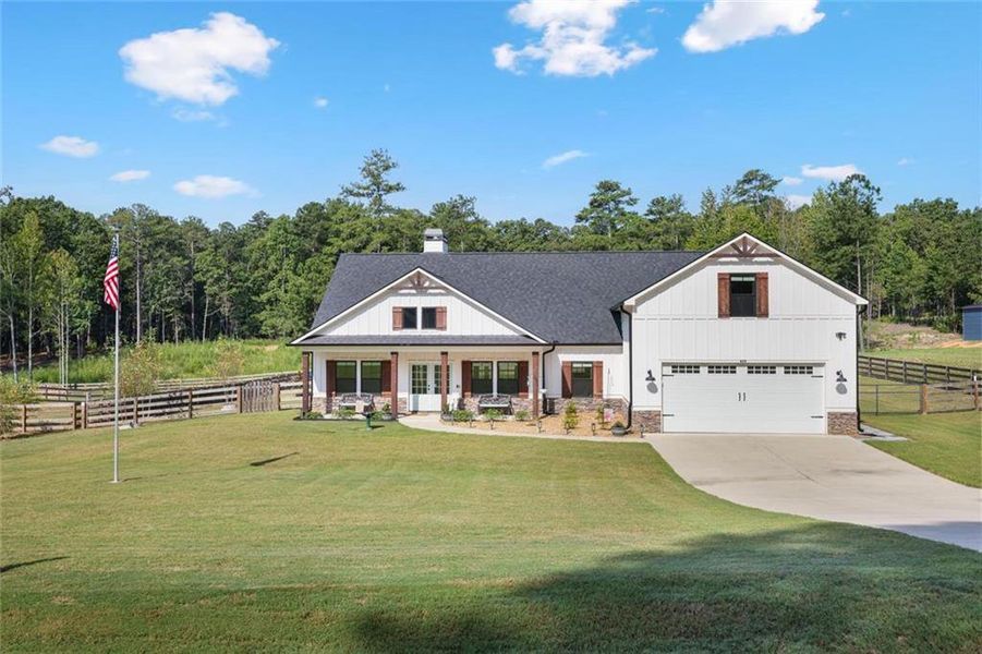 Front exterior of a new home in , Dallas, GA, highlighting curb appeal (Image 25).
