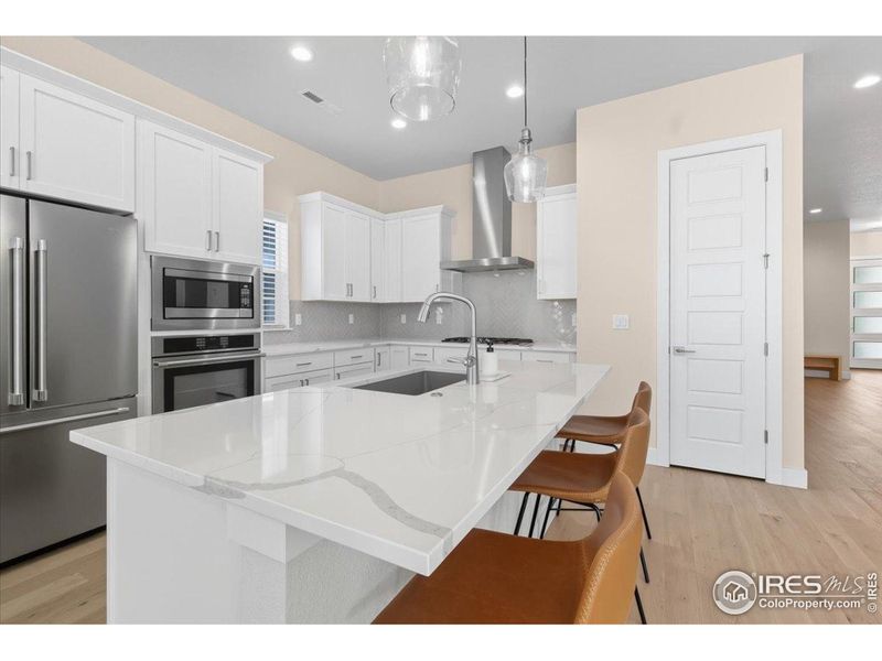 Furnished interior view inside a new home in Pelican Shores at Water Valley, Windsor (Image 6).