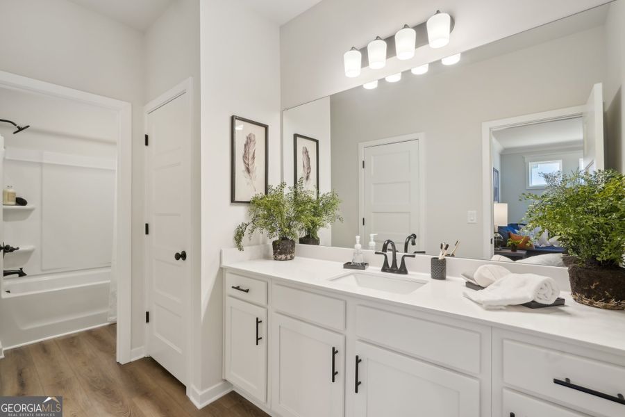 Furnished interior view inside a new home in Ponderosa Farms Reserve, Gainesville (Image 14).