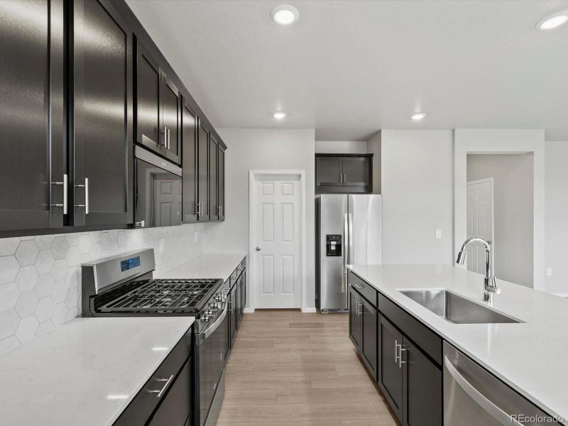 Furnished interior view inside a new home in Poudre Heights: The Alpine Collection, Windsor (Image 8).