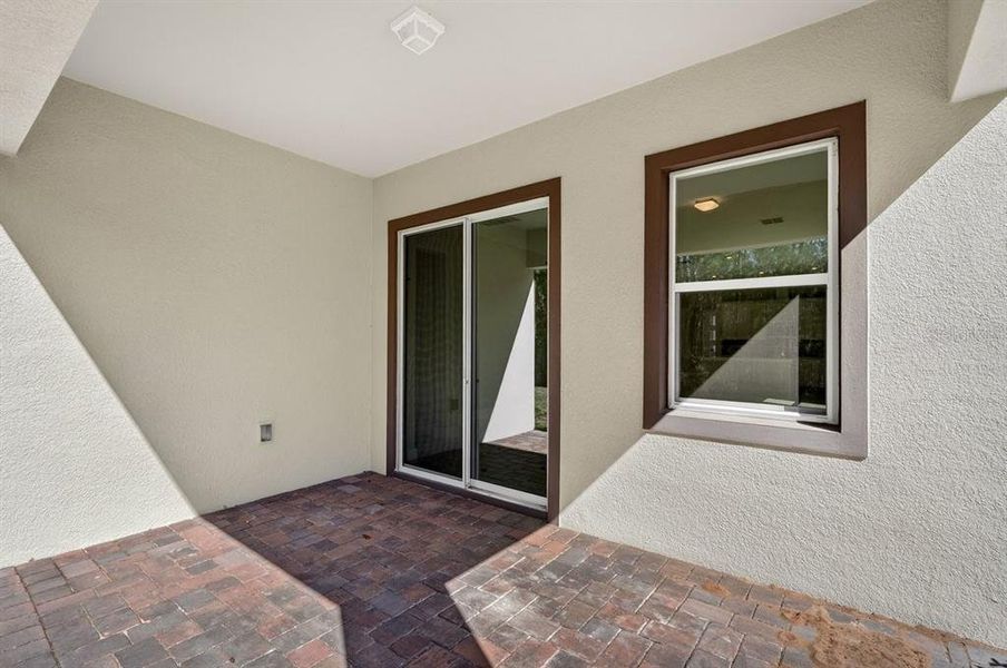 Exterior details and patio area of a home in Gray Hawk at Hole Two, Daytona Beach (Image 31).