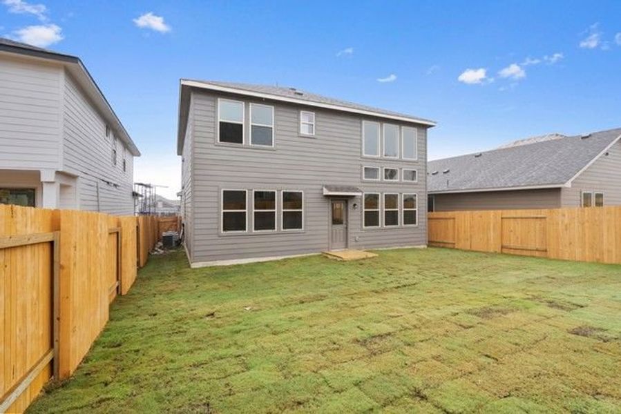 Front exterior of a new home in Morningstar, Georgetown, TX, highlighting curb appeal (Image 10).