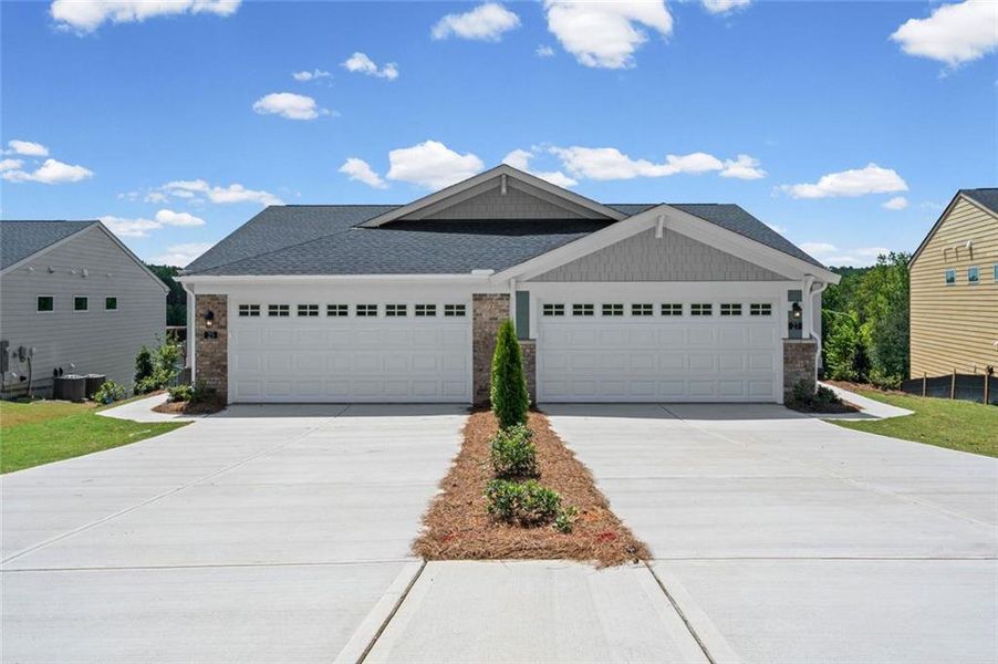 Front exterior of a new home in Villas at Gold Creek, Dawsonville, GA, highlighting curb appeal (Image 20).