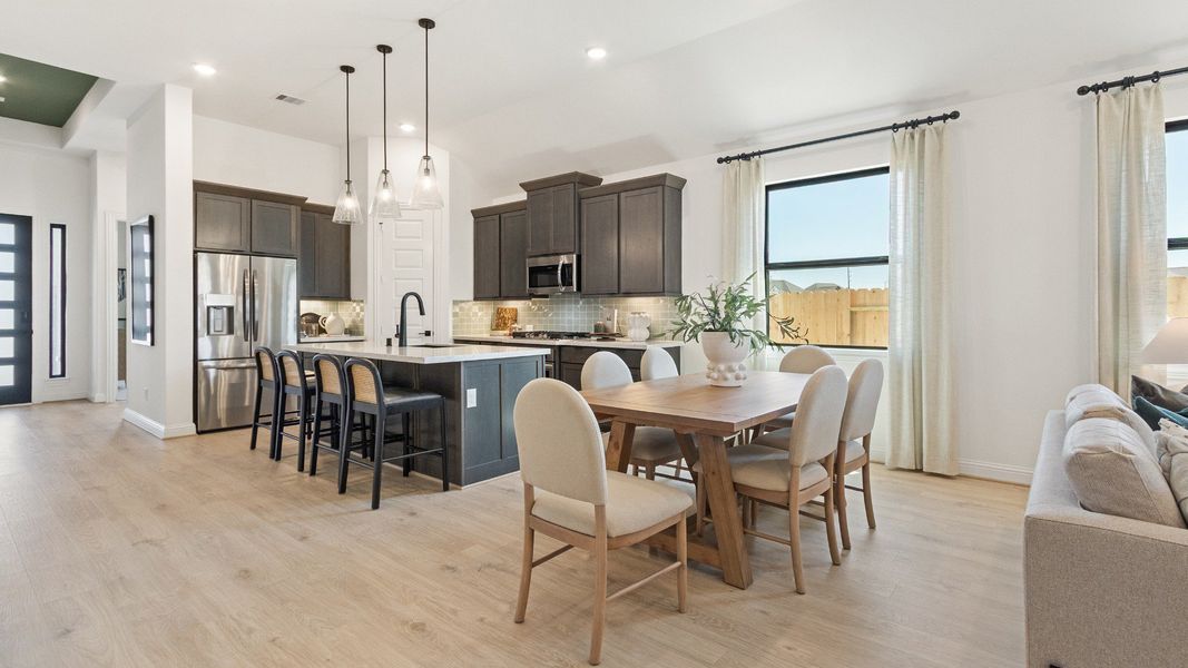 Representative furnished interior of a home built from the Oleander by Brightland Homes in Sunterra, Katy (Image 7).