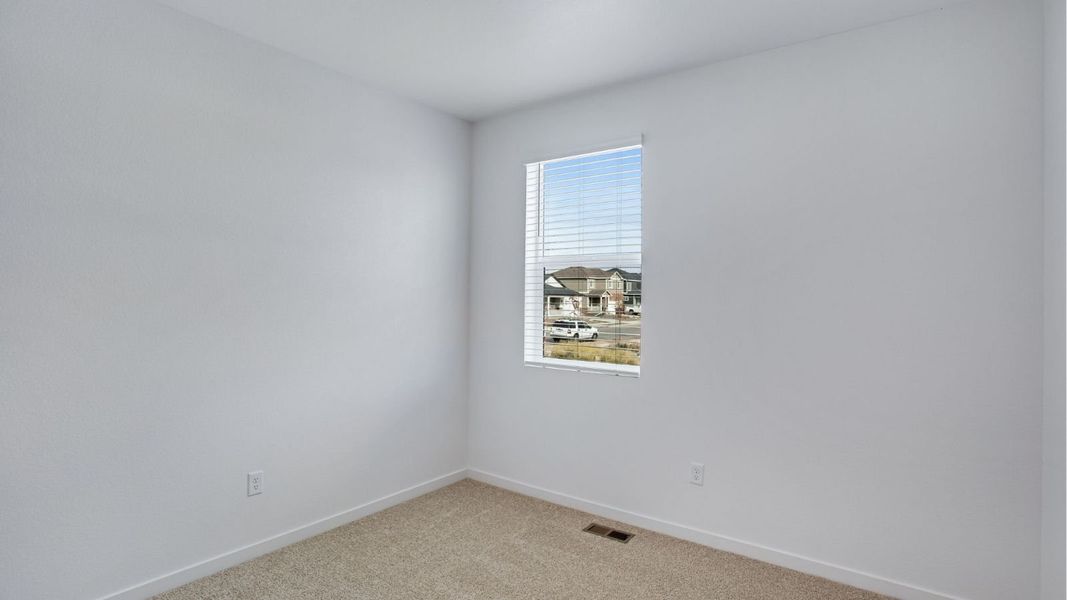 Representative unfurnished interior of a home built from the Newcastle by D.R. Horton in Tailholt, Severance (Image 14).