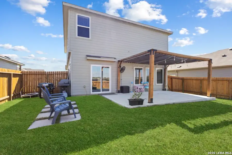 Exterior details and patio area of a home in Legend Pond, New Braunfels (Image 4).