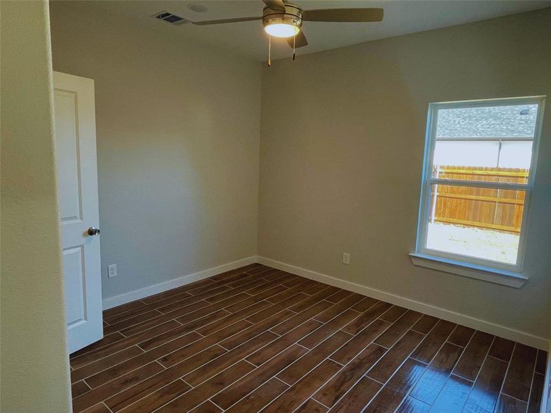 Unfurnished room with ceiling fan