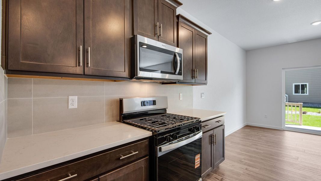 Furnished interior view inside a new home in Trails at Crowfoot, Parker (Image 11).