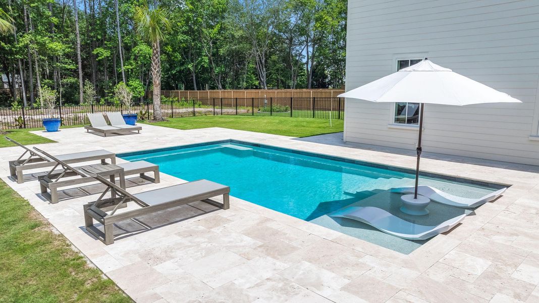 Exterior details and patio area of a home in , Johns Island (Image 41).
