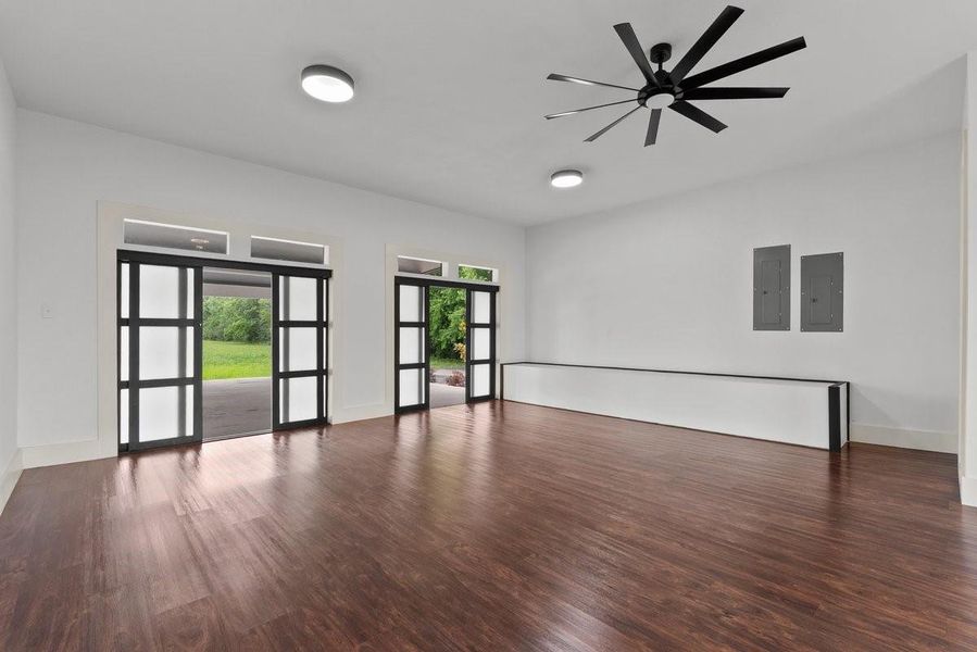 Additional view of versatile separate space featuring two sliding doors