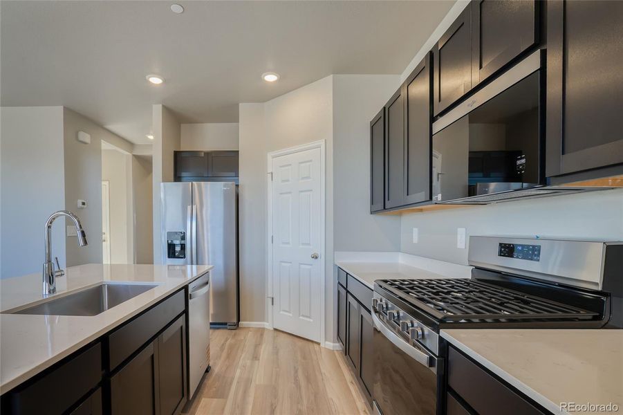 Furnished interior view inside a new home in Buffalo Highlands: The Flora Collection, Commerce City (Image 7).