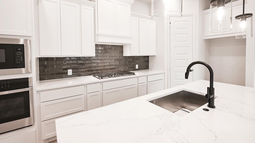 Furnished interior view inside a new home in 6 Creeks, Kyle (Image 13).
