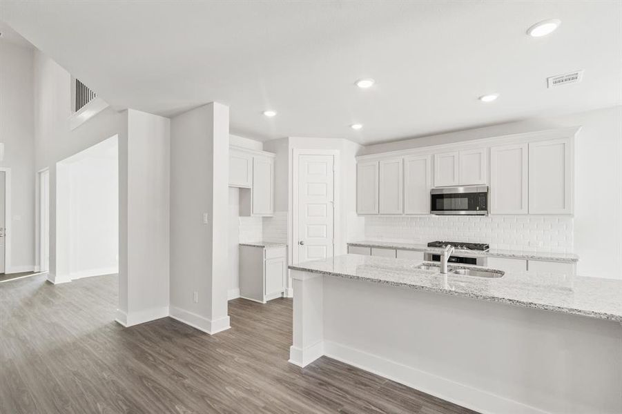 Furnished interior view inside a new home in , Garland (Image 7).