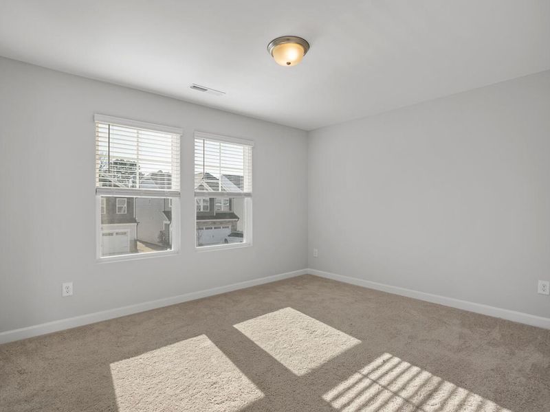 Spacious, unfurnished interior of a new home in Gregory Village, Lillington (Image 25).