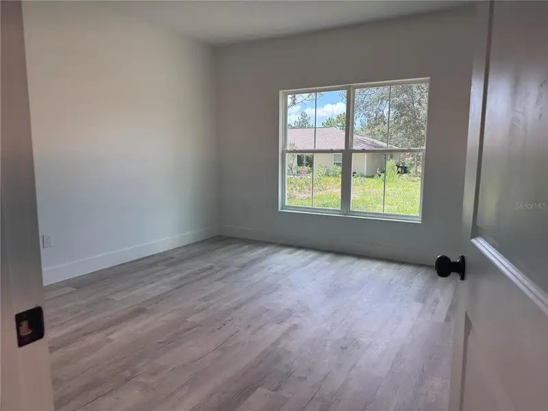 Spacious, unfurnished interior of a new home in , Dunnellon (Image 10).