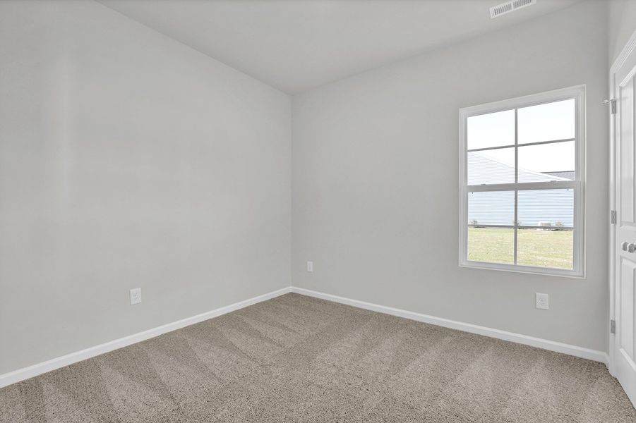 Spacious, unfurnished interior of a new home in River Tide Farms, Bolivia (Image 21).