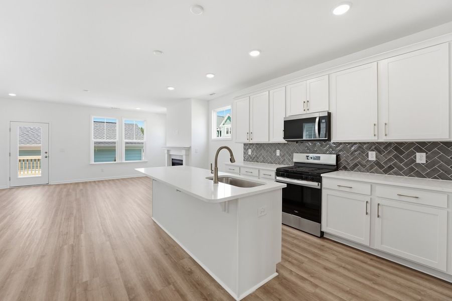 Representative furnished interior of a home built from the Blair by Brookfield Residential in Wendell Falls, Wendell (Image 4).