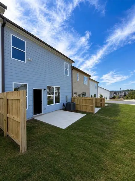 Exterior details and patio area of a home in Somerset at Riverbrook, Gainesville (Image 3).