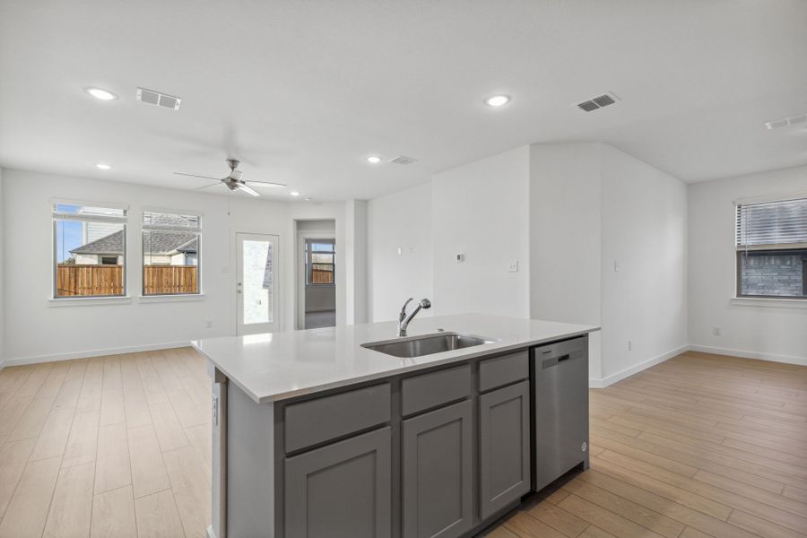 Kitchen in the Oak II home plan by Trophy Signature Homes – REPRESENTATIVE PHOTO