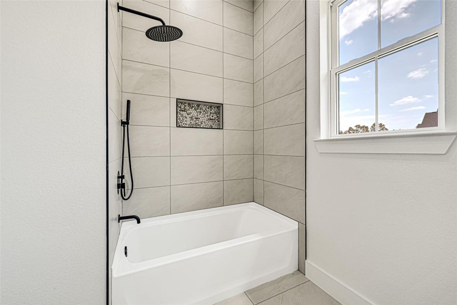 Furnished interior view inside a new home in , Conroe (Image 7).