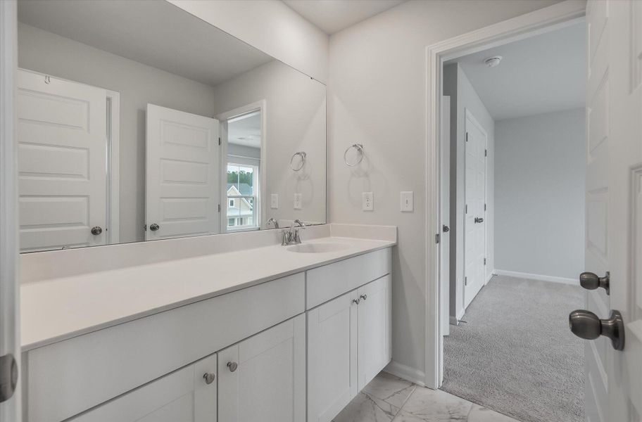 Furnished interior view inside a new home in Sweetgrass at Summers Corner, Summerville (Image 37).