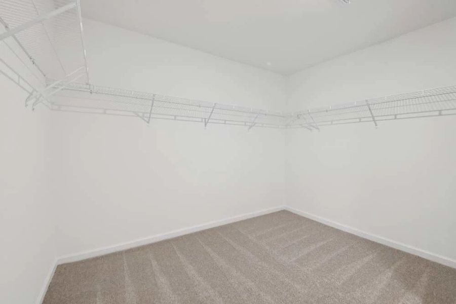 Spacious Primary Bedroom Walk-In Closet Spacious Primary Bedroom Walk-In Closet