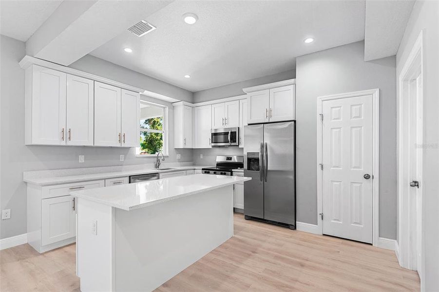 Furnished interior view inside a new home in , Winter Haven (Image 6). Furnished interior view inside a new home in , Winter Haven (Image 6).