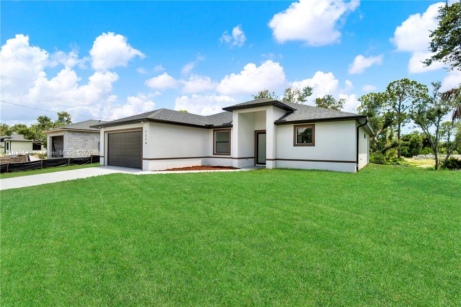 If you're looking for 2 great houses next to eac other, the house next door is being built by the same developer.  It will be finished in just a couple of months.