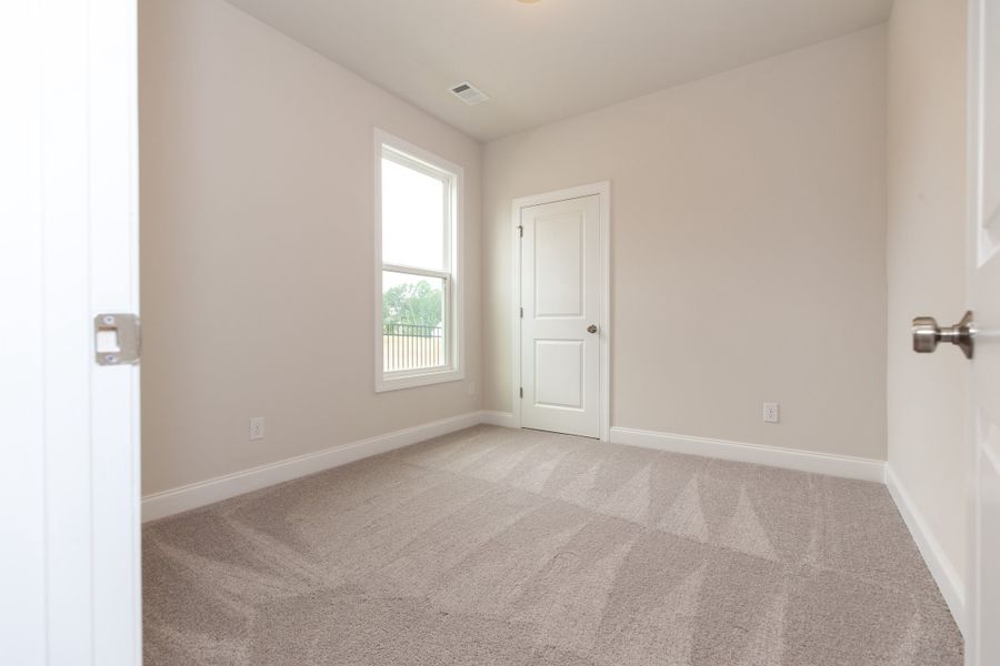 Representative unfurnished interior of a home built from the The Owens by The Providence Group in Waterhaven, Cumming (Image 37).