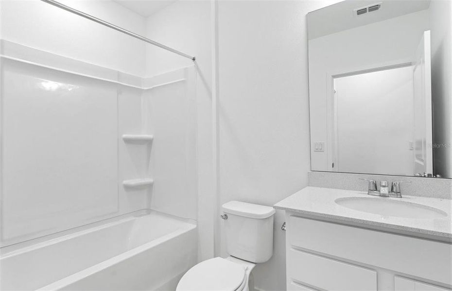 Furnished interior view inside a new home in Oakfield Lakes, Parrish (Image 6).