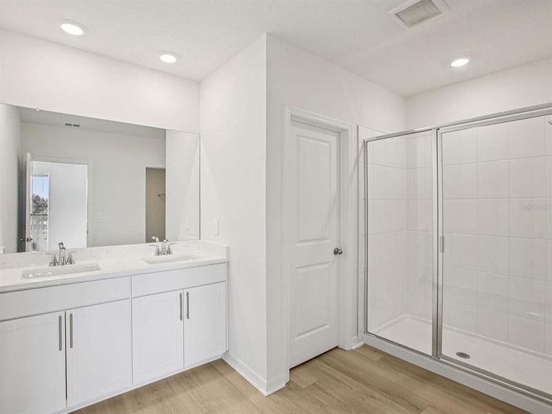 Furnished interior view inside a new home in The Grove at Stuart Crossing - Classic Series, Bartow (Image 12).