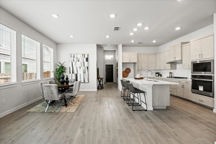 Furnished interior view inside a new home in Trace, San Marcos (Image 17).