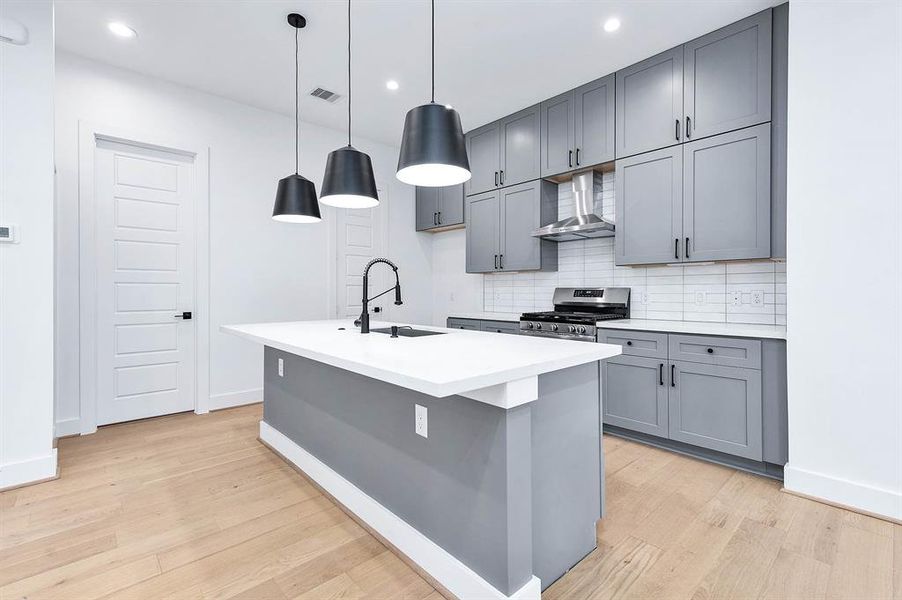 Kitchen area with oversized island.