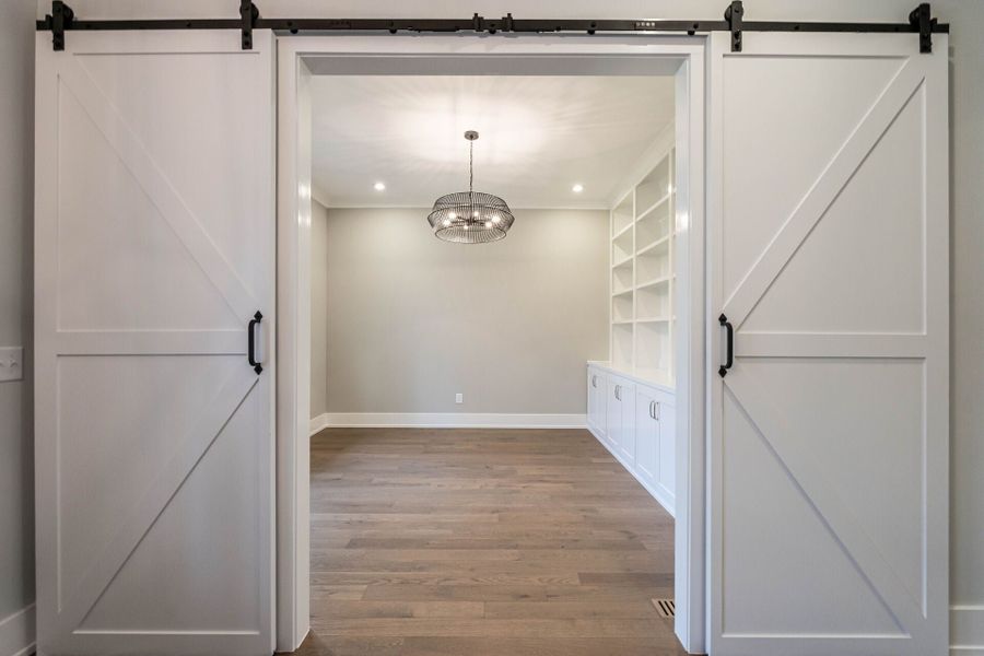 Representative unfurnished interior of a home built from the Oakmont American Farmhouse by Homes by Dickerson in Corbett Landing, Pittsboro (Image 8).