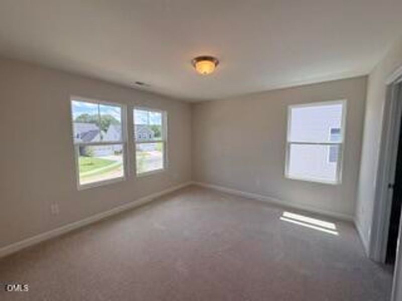 Spacious, unfurnished interior of a new home in Woodland Crossing, Zebulon (Image 19).