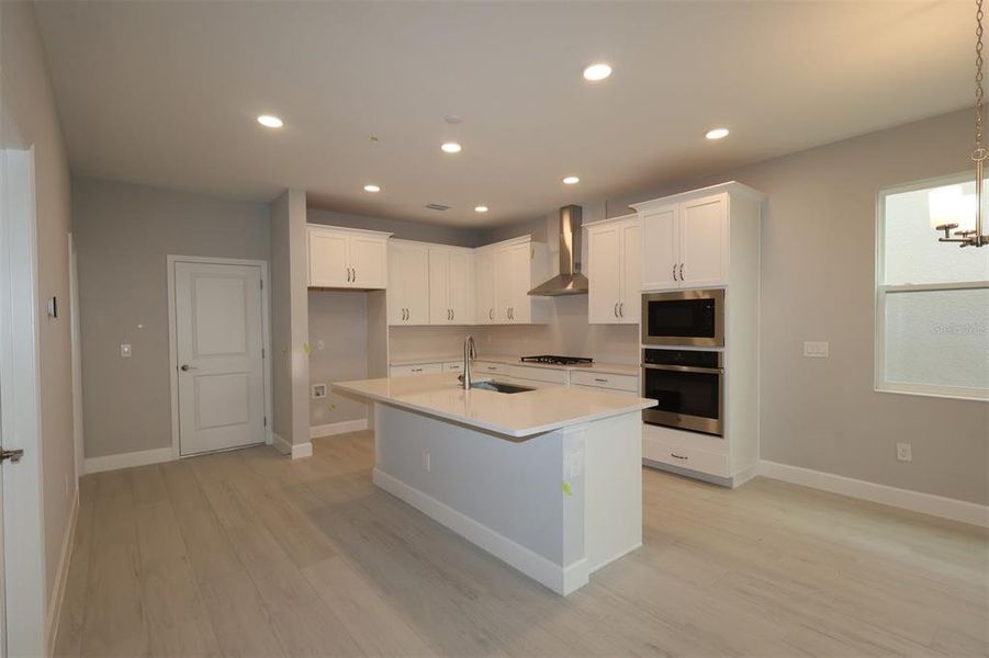 Furnished interior view inside a new home in Lake Star at Ovation, Winter Garden (Image 8).