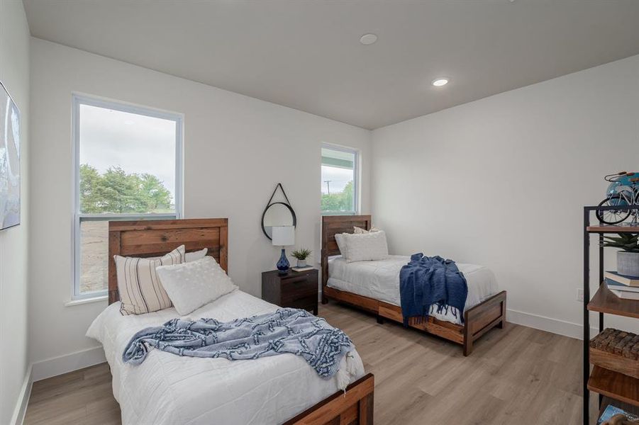 Bedroom featuring light wood-type flooring