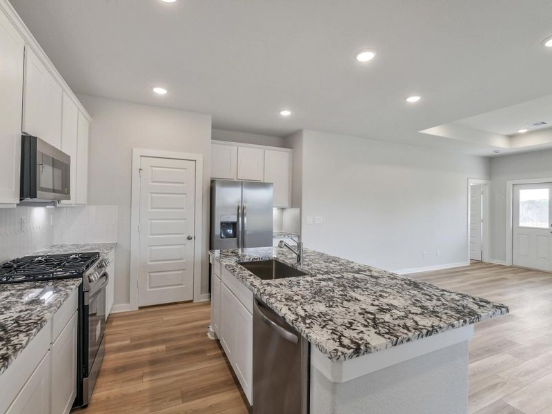 Furnished interior view inside a new home in Windmill Estates, Magnolia (Image 7).