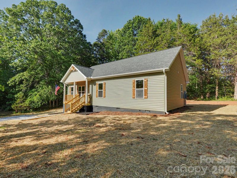Exterior details and patio area of a home in , Mooresville (Image 22).
