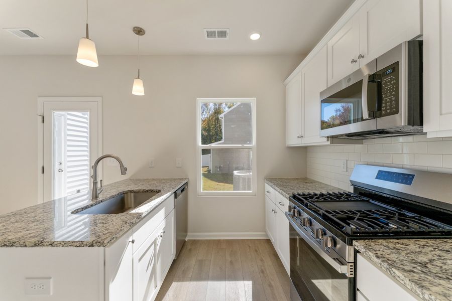 Furnished interior view inside a new home in Edwards Station, Taylors (Image 7).