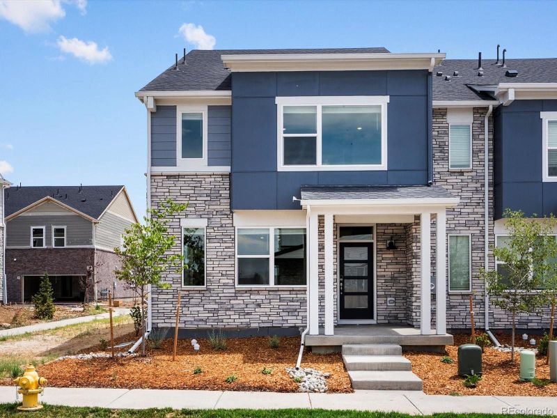 Front exterior of a new home in Horizon Uptown: The Meadow Collection, Aurora, CO, highlighting curb appeal (Image 14). Front exterior of a new home in Horizon Uptown: The Meadow Collection, Aurora, CO, highlighting curb appeal (Image 14).