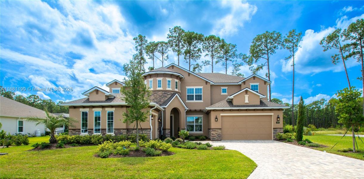 Front exterior of a new home in Westlake Single Family, Ormond Beach, FL, highlighting curb appeal (Image 1). Front exterior of a new home in Westlake Single Family, Ormond Beach, FL, highlighting curb appeal (Image 1).