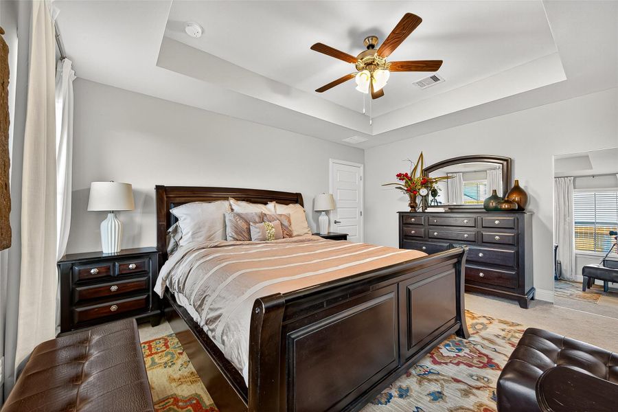 Furnished interior view inside a new home in Sunterra, Katy (Image 22).